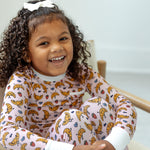 portrait of girl in croissant pajamas